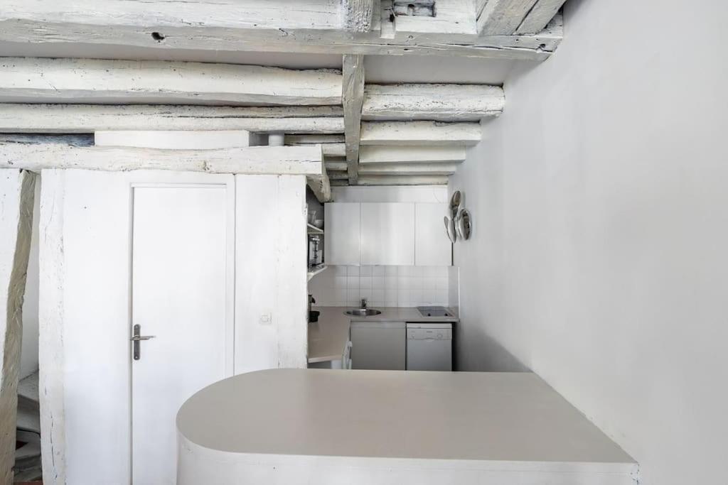 Appartamento Joli Duplex Au Coeur Du Marais Parigi Esterno foto